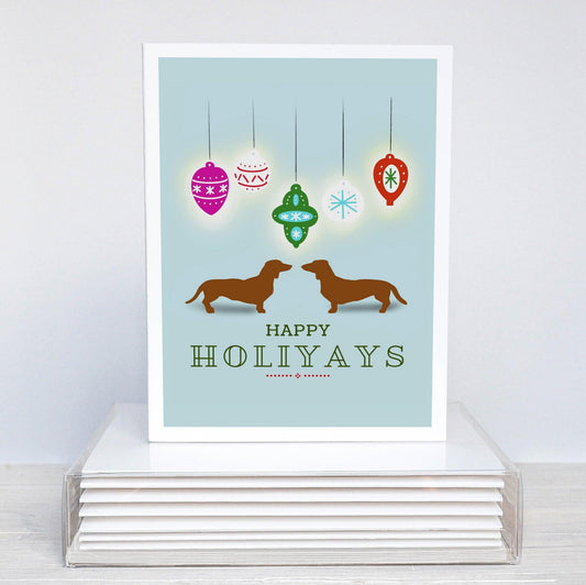 Two dachshunds with christmas ornaments holiday card
