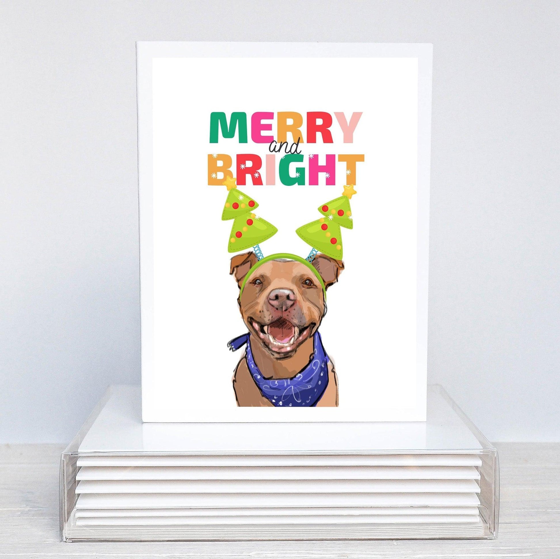 smiling pit bull christmas card with blue bandana and festive holiday headband