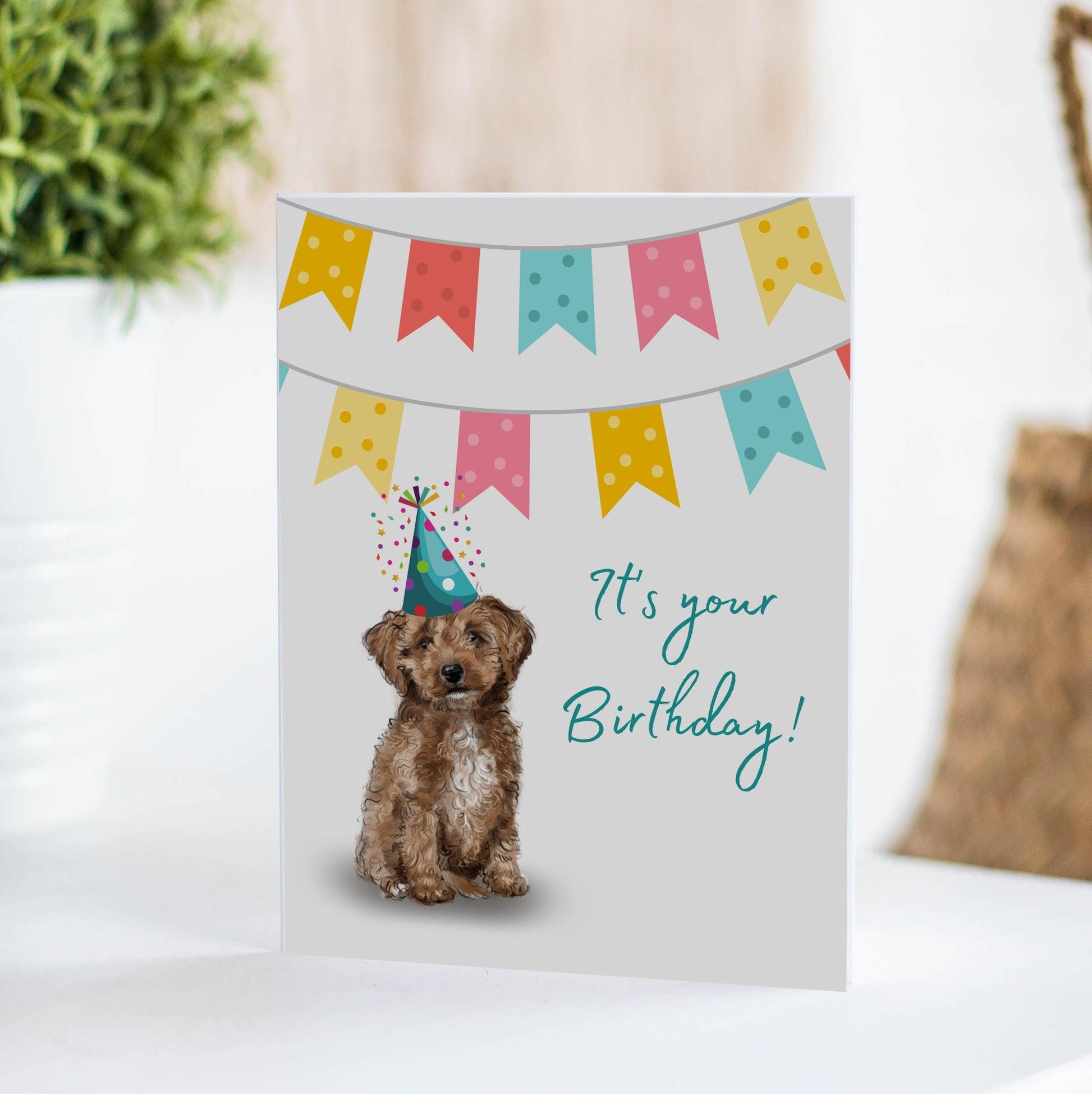 birthday card with banner and cute doodle puppy wearing a birthday hat